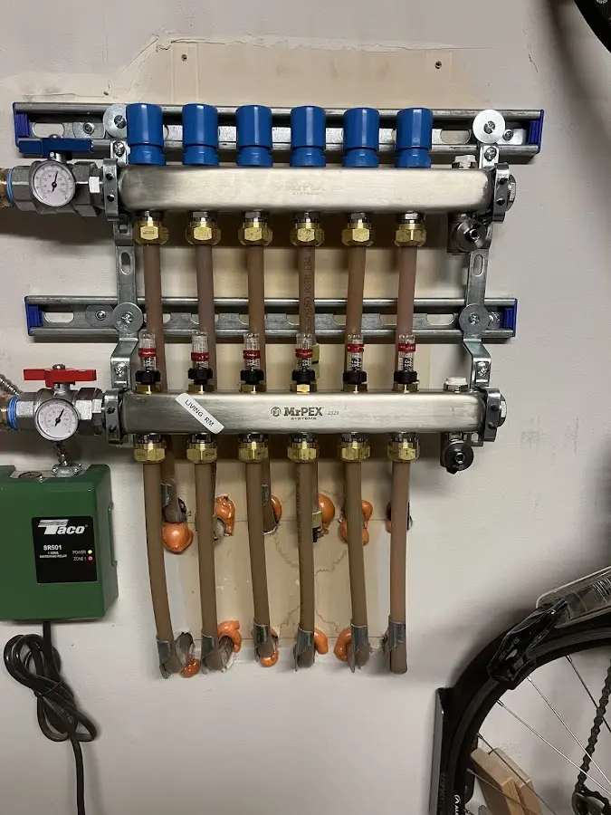 Plumber performing Water Heater Repair at a residential property in Wrightstown